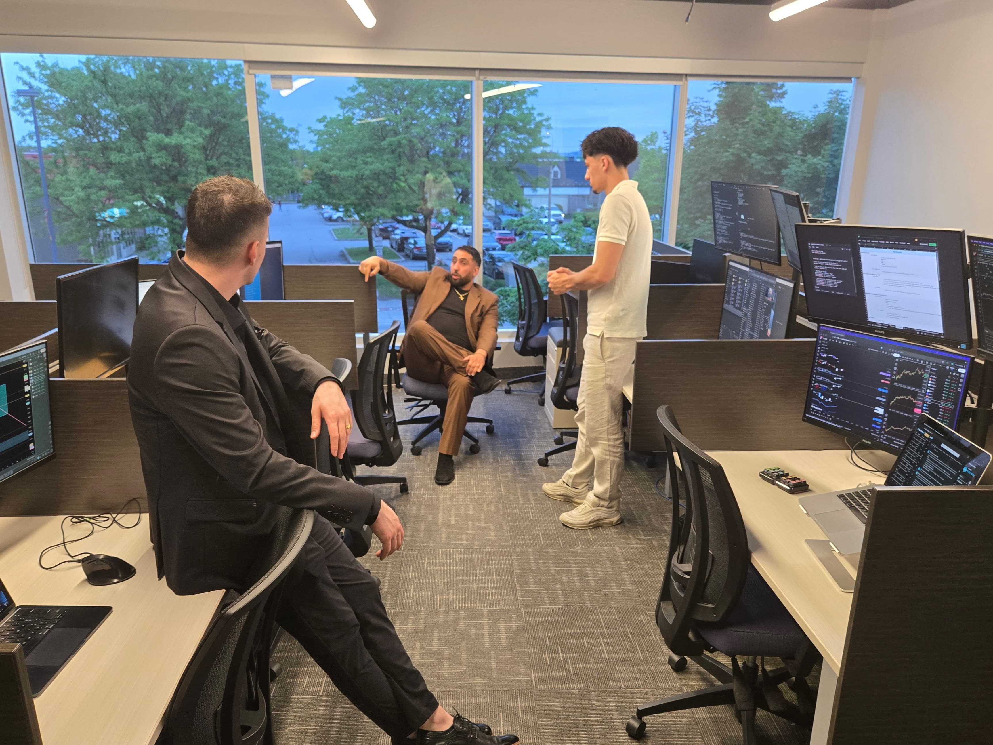 The group at work in the trading room